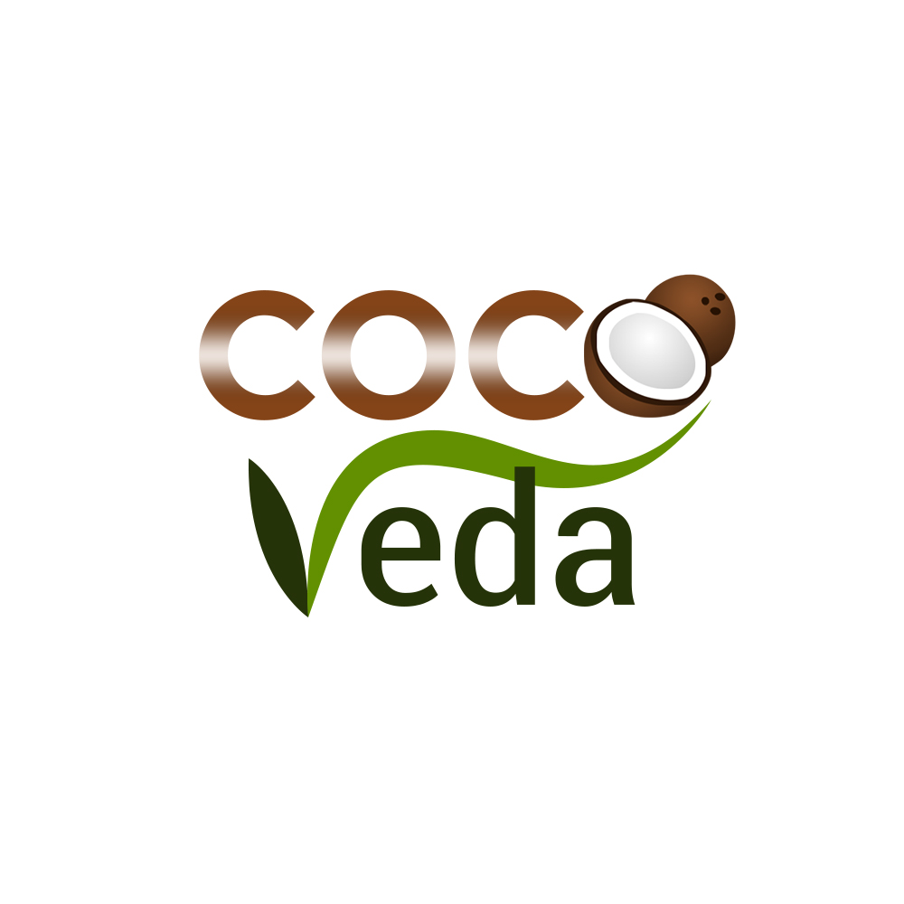 Coco Veda original logo — brown coconut lettering, coconut illustration and green leaf forming the word Veda